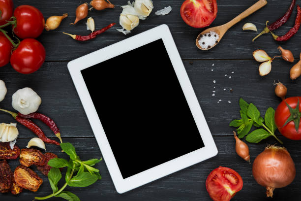 istock Blank digital tablet with fresh ingredients for cooking 1004404416
