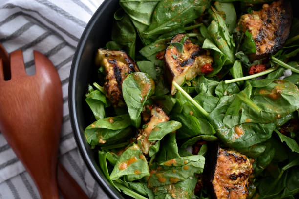 istock Grilled Eggplant and Spinach Salad 1004439538
