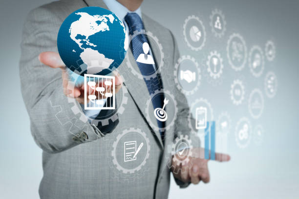 istock businessman hand shows success and globe 1004449602
