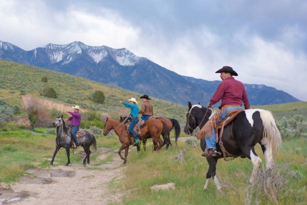 istock Ranchers on horses in Utah, USA 1004459312