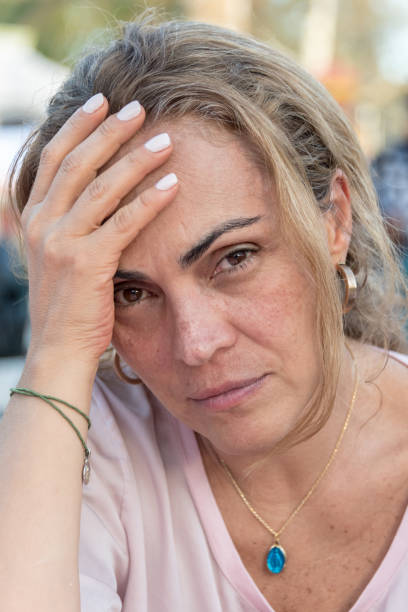 istock Sad pensive mature woman 1004459614