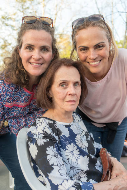 istock Senior woman posing with her mature daughters 1004459762