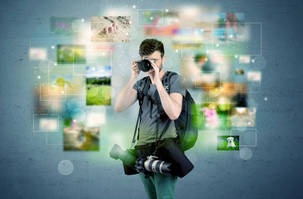 istock Photographer with pictures from the past 1004460686
