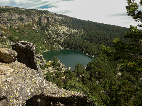 Impressive lake surrounded by forest in Huesca.