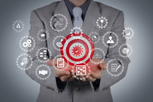 istock businessman pointing target symbol as success concept 1004475600