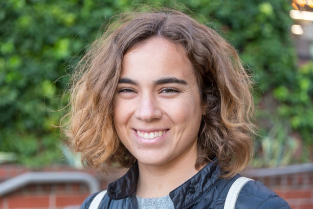 istock Smiling young woman looking at the camera 1004485884