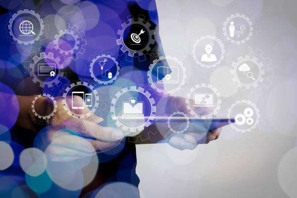 istock Double exposure of businessman hand using Tablet computer with colour cloud concept 1004490986