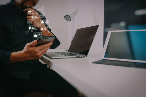 istock businessman working with smart phone and digital tablet and laptop computer in modern office 1004494128