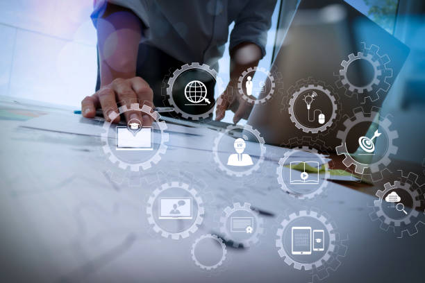 istock business documents on office table with smart phone and digital tablet and graph business diagram and man working in the background 1004500218