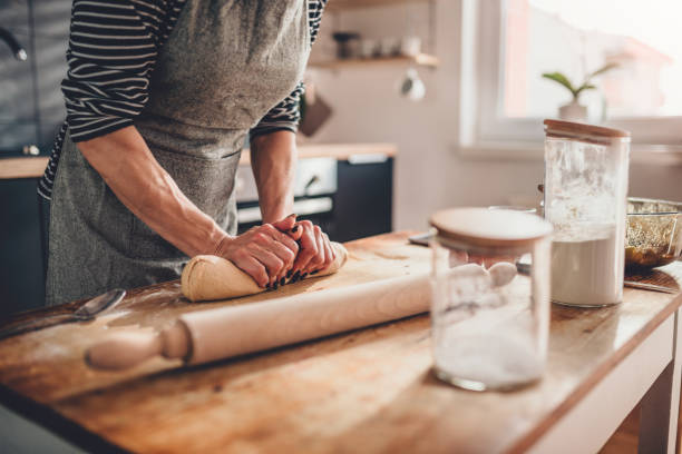 istock Woman kneading dough 1004500816