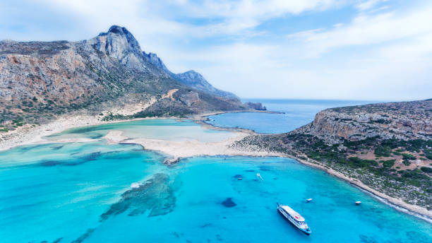 istock Sandy beaches and  pristine turquoise waters, Cretean Island, Greece, Mediterranean sea . 1004503178