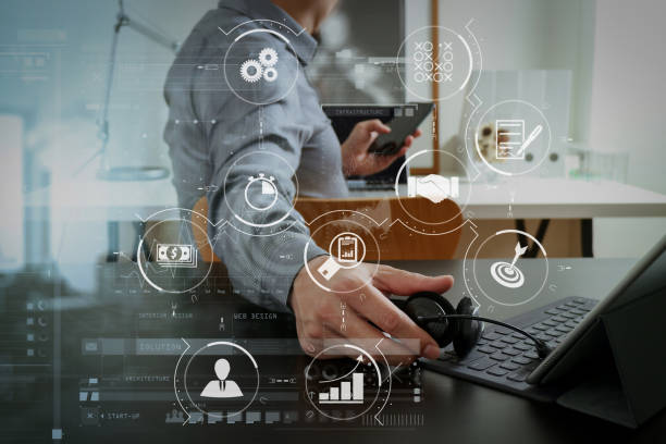 istock businessman using VOIP headset with digital tablet computer and smart phone,as concept communication and call center or customer service help desk in modern office 1004512854