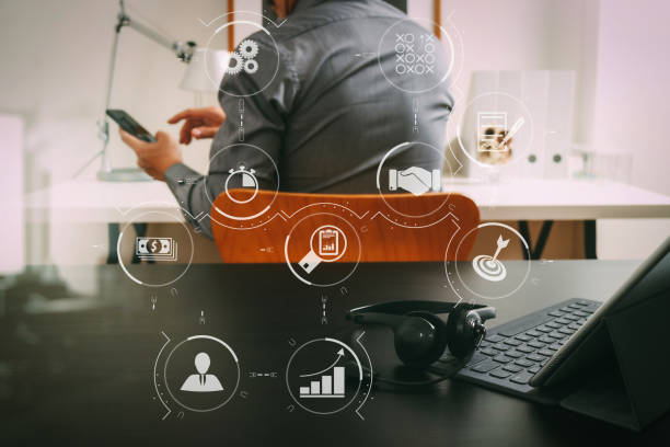 istock businessman using VOIP headset with digital tablet computer and smart phone,as concept communication and call center or customer service help desk in modern office 1004515888