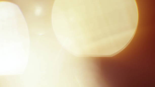 istock Real Lens Flare Shot in Studio over Black Background 1004537408