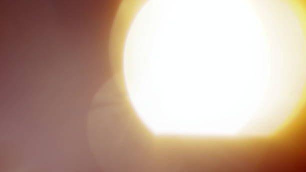 istock Real Lens Flare Shot in Studio over Black Background 1004537494