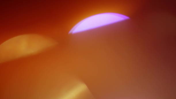 istock Real Lens Flare Shot in Studio over Black Background 1004539776