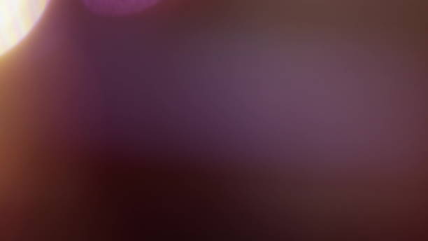 istock Real Lens Flare Shot in Studio over Black Background 1004539926