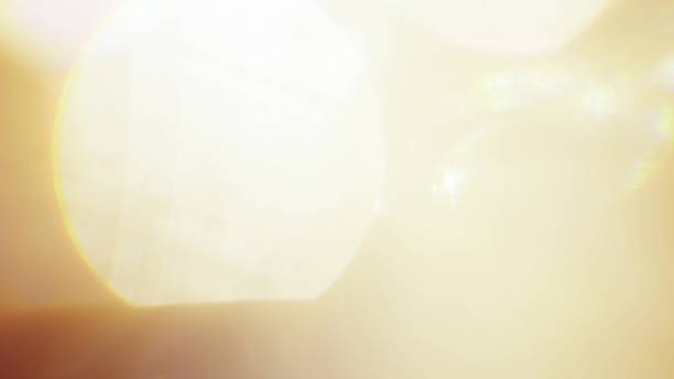 istock Real Lens Flare Shot in Studio over Black Background 1004540142
