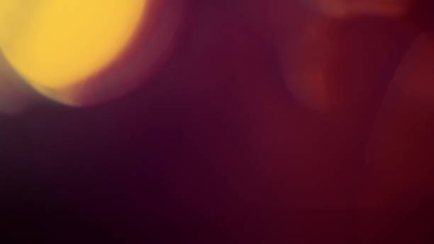 istock Real Lens Flare Shot in Studio over Black Background 1004540478