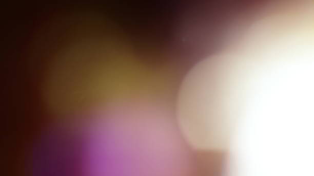 Real Lens Flare Shot in Studio over Black Background Real Lens Flare Shot in Studio over Black Background. Easy to add as Overlay or Screen Filter film camera overlay stock pictures, royalty-free photos & images
