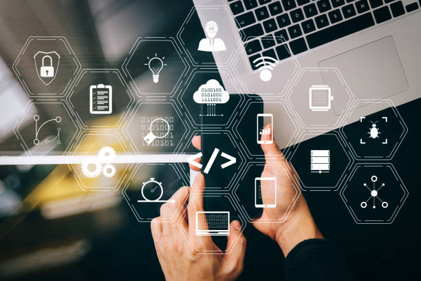 istock cyber security internet and networking concept.Businessman hand working with VR screen padlock icon on mobile phone and digital tablet laptop computer 1004540786