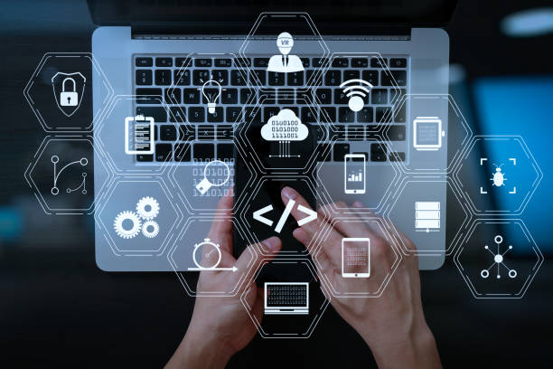 istock cyber security internet and networking concept.Businessman hand working mobile phone on laptop computer background 1004543180