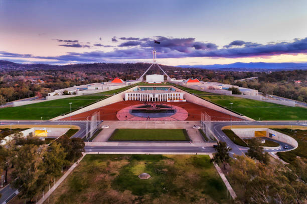 D CAN Parl hill front Aerial view around Capitol hill in Canberra - Australian Capital Territory. Facade of public government building with square and surrounding park lands. canberra photos stock pictures, royalty-free photos & images