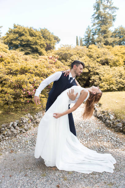 istock Husband and wife in a garden 1004543568