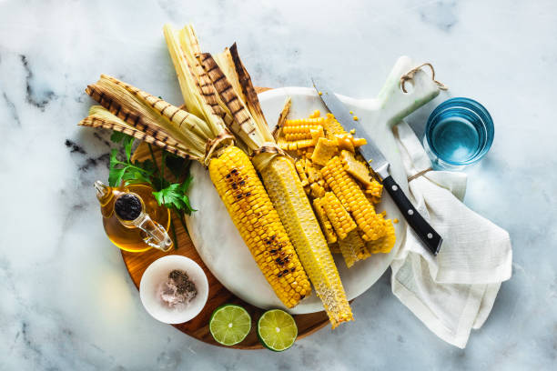 istock Cut corn from the corn cob. cooking a summer light meal. salad or light healthy lunch 1004545940