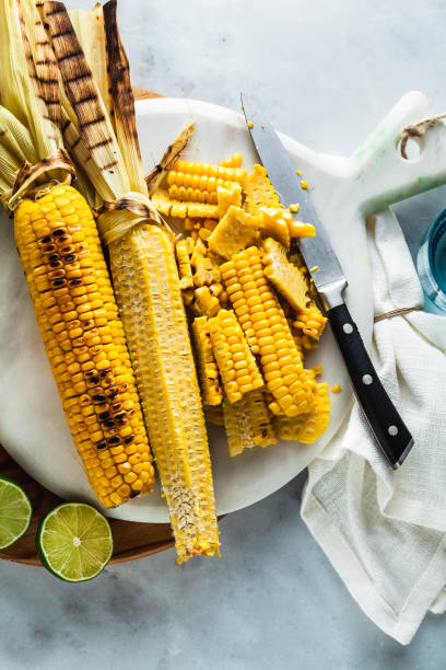 istock Cut corn from the corn cob. cooking a summer light meal. salad or light healthy lunch 1004545962