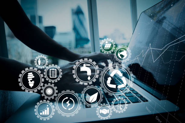 istock business man hand working on laptop computer with business graph information diagram on wooden desk as concept 1004556500