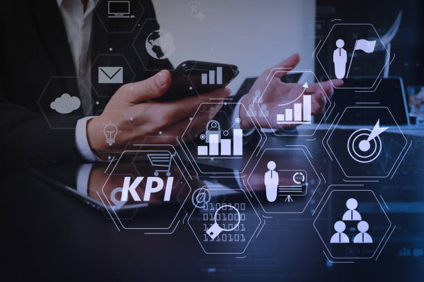 istock businessman working with smart phone and digital tablet and laptop computer in modern office with virtual icon diagram 1004564058