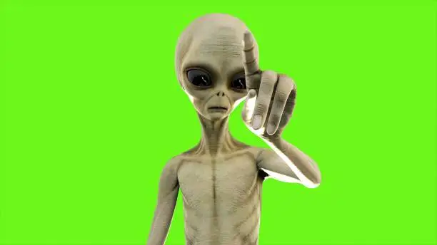 Alien presses the button on background green screen.