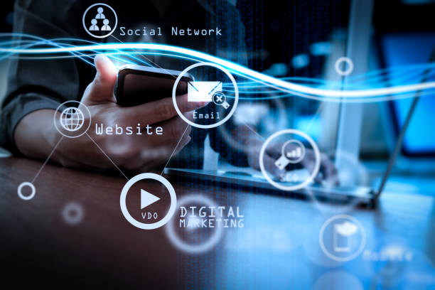 istock Waves of blue light and businessman using on smartphone as concept 1004567044
