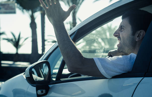 istock Crazy driver yelling from car on sunny day 1004608268