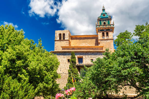 istock Valdemossa monastery historic building and vivid green trees and plants 1004644408