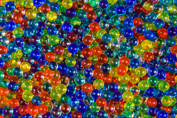 istock Texture of multicolored hydrogel balls for the background 1004651282