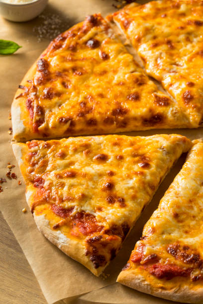 istock Homemade Greasy New York Cheese Pizza 1004654534