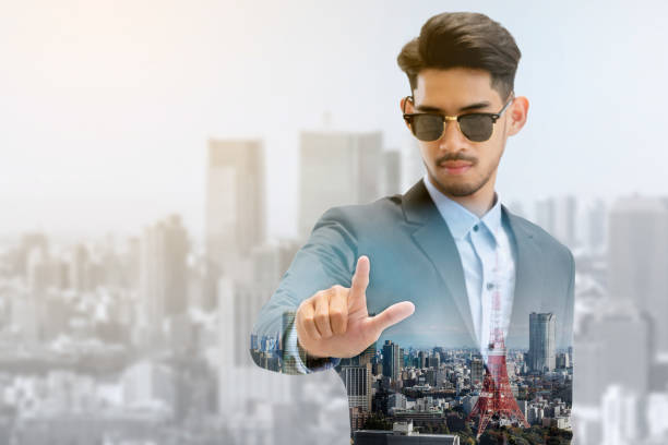 Double exposure businessman pointing at copy space
