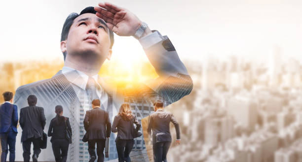 istock Double exposure - Business Leader and Team. 1004684562