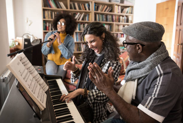 istock Music Teacher Having Lesson At Piano 1004691684
