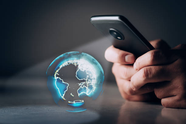 istock Holographic Earth projection from smartphone 1004706832