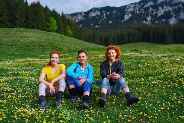 istock hiker friends enjoying relaxing 1004712480