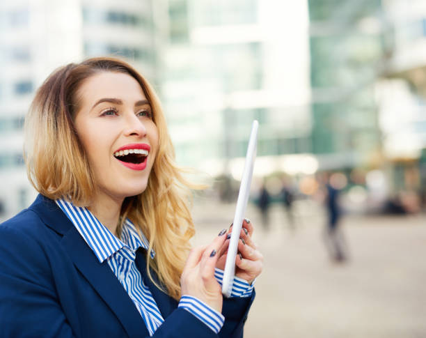 istock business woman with digital tablet 1004712508