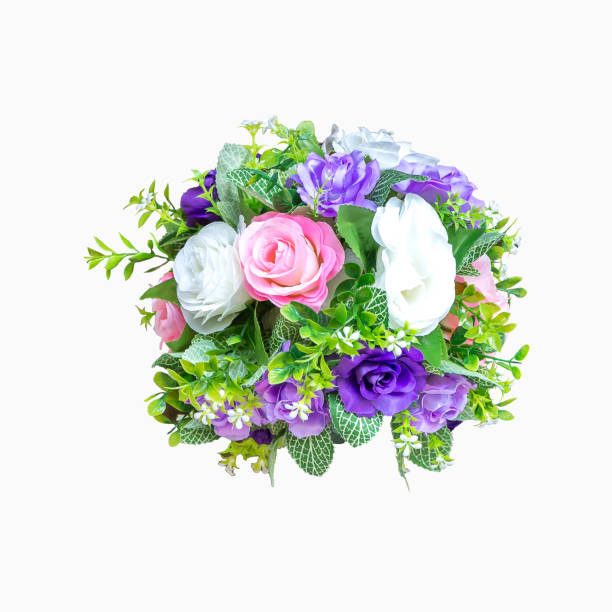 Bouquet of beautiful artificial flowers on isolated white background.