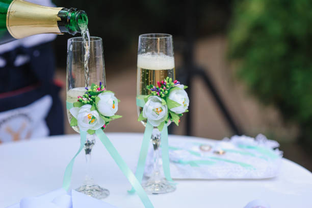 two wedding glass pour champagne decorated with flowers