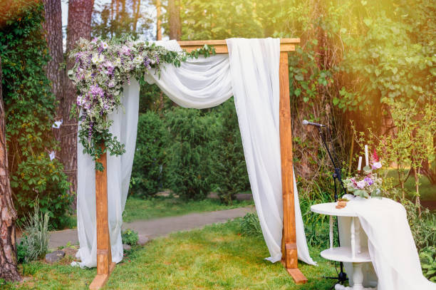 istock wedding arch in the style of rustic pine summer park 1004722292