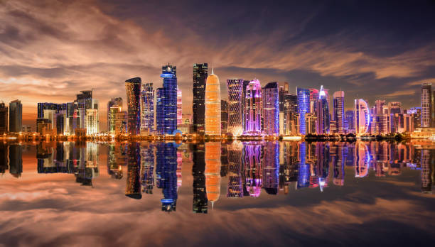 istock Panoramic view of illuminated Doha with reflections in the bay, Qatar 1004731620