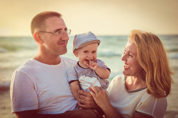 istock Family on the beach 1004737374