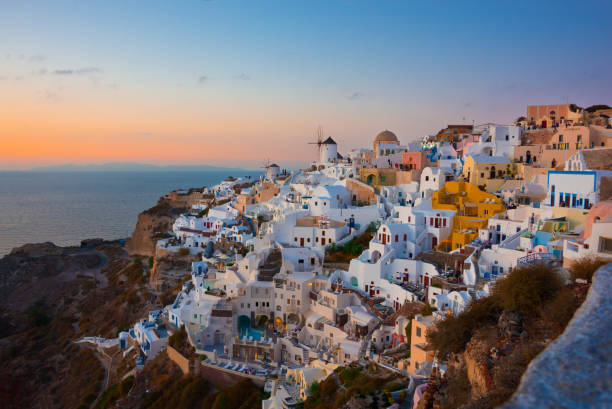 istock Sunset in Oia on Santorini island, Greece 1004741368
